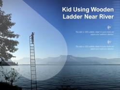 Kid using wooden ladder near river