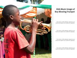 Kids music image of boy blowing trumpet
