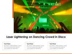 Laser lightening on dancing crowd in disco