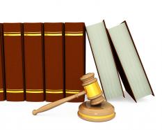 Law books with gavel stock photo