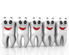 Line of teethes with smiley face stock photo