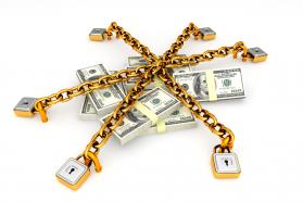 Locks with chains and dollars stock photo