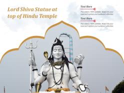 Lord shiva statue at top of hindu temple