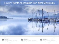 Luxury yachts anchored in port near mountains