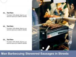 Man barbecuing skewered sausages in streets