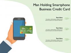 Man holding smartphone business credit card