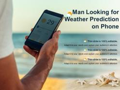 Man looking for weather prediction on phone