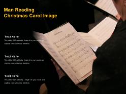 Man reading christmas carol image