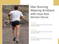 Man running wearing armband with heart rate monitor device