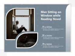 Man sitting on window while reading novel