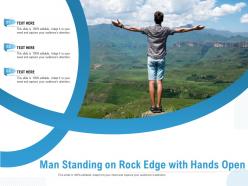 Man Standing On Rock Edge With Hands Open