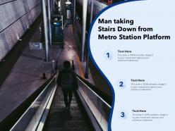 Man taking stairs down from metro station platform