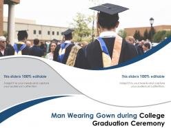 Man wearing gown during college graduation ceremony