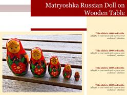 Matryoshka russian doll on wooden table