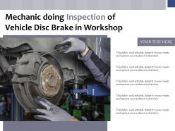Mechanic Doing Inspection Of Vehicle Disc Brake In Workshop