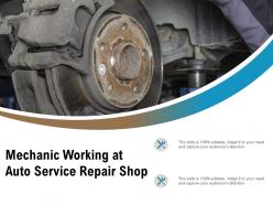 Mechanic Working At Auto Service Repair Shop