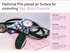 Medicinal pills placed on surface for controlling high blood pressure