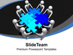 Men holding blue puzzles solution teamwork powerpoint templates ppt themes and graphics 0313
