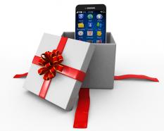 Mobile phone inside a gift box stock photo