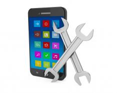 Mobile with two wrenches for tools and service stock photo