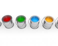 Multicolored paint buckets stock photo