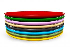 Multicolored plates making tower stock photo