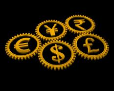 Multiple graphic of gears with currency symbols stock photo