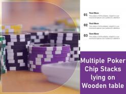 Multiple poker chip stacks lying on wooden table