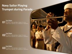 Navy sailor playing trumpet during parade