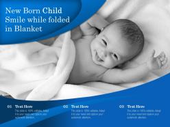New born child smile while folded in blanket