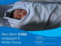 New born child wrapped in white towel