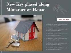 New Key Placed Along Miniature Of House