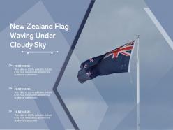 New zealand flag waving under cloudy sky