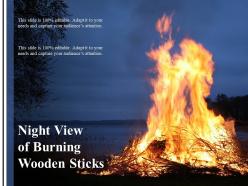 Night view of burning wooden sticks
