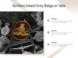Northern ireland army badge on table