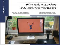Office table with desktop and mobile phone near window