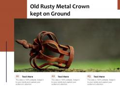 Old rusty metal crown kept on ground