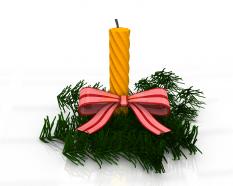 One yellow decorative candle on christmas tree stock photo