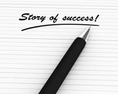 Pen writing story of success stock photo