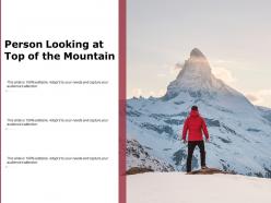 Person looking at top of the mountain