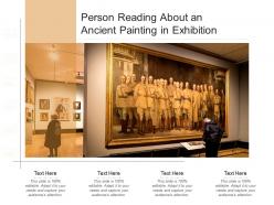 Person reading about an ancient painting in exhibition