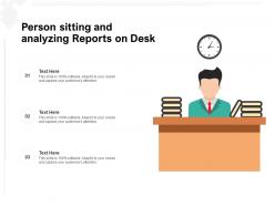 Person sitting and analyzing reports on desk