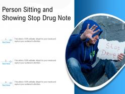Person sitting and showing stop drug note