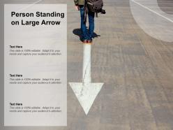 Person standing on large arrow