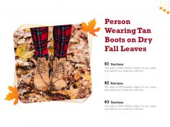 Person wearing tan boots on dry fall leaves