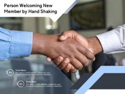 Person welcoming new member by hand shaking