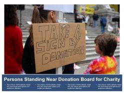 Persons standing near donation board for charity