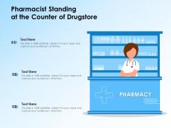Pharmacist standing at the counter of drugstore