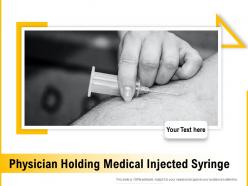 Physician holding medical injected syringe
