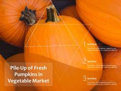 Pile up of fresh pumpkins in vegetable market